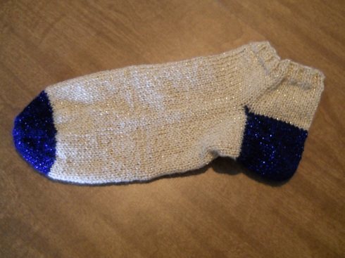 Shorty socks in progress using Vanna's Glamour yarn with a fish lips kiss heel. 